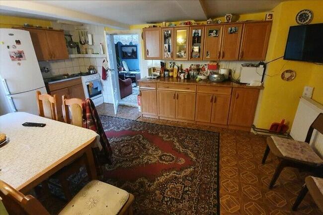 Dom z budynkami na 73 arowej działce