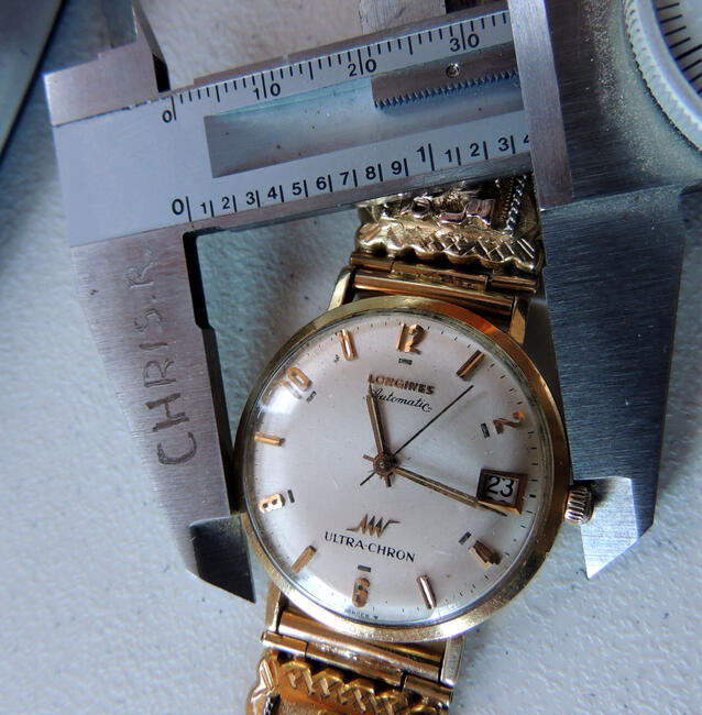 Złoty, 18k zegarek Longines z bransoletą i pierścieniem.