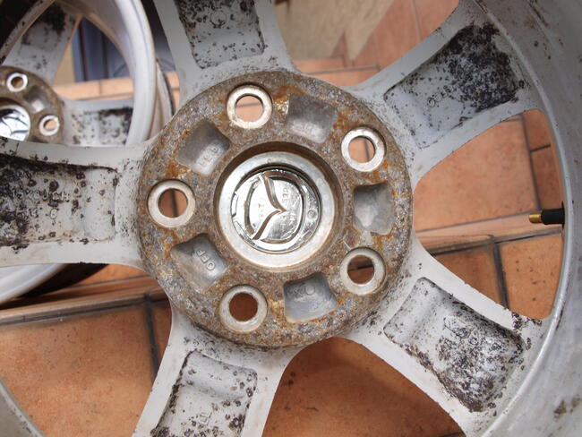 Mazda felgi alufelgi 15 oryginalne (komplet 4 sztuki)