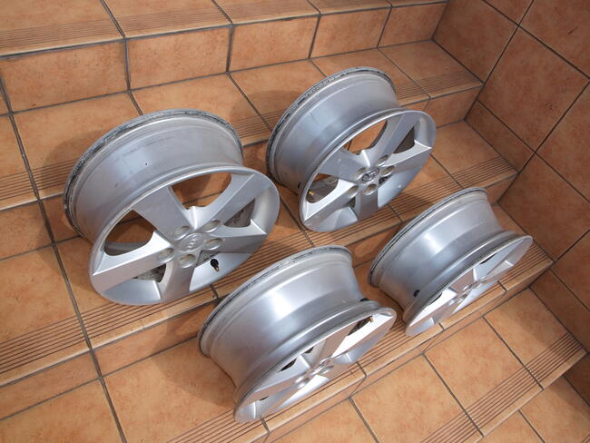 Mazda felgi alufelgi 15 oryginalne (komplet 4 sztuki)