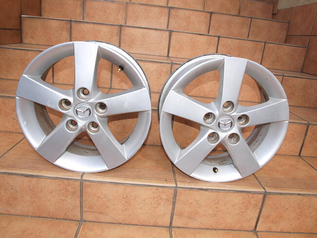 Mazda felgi alufelgi 15 oryginalne (komplet 4 sztuki)