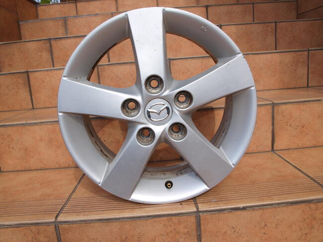 Mazda felgi alufelgi 15 oryginalne (komplet 4 sztuki)