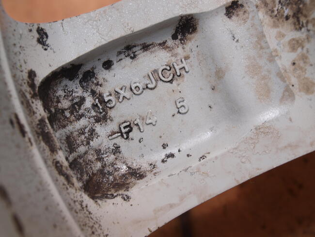 Mazda felgi alufelgi 15 oryginalne (komplet 4 sztuki)