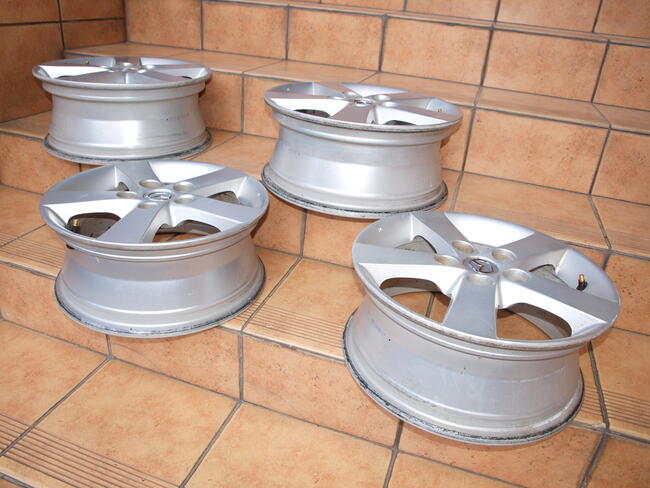 Mazda felgi alufelgi 15 oryginalne (komplet 4 sztuki)