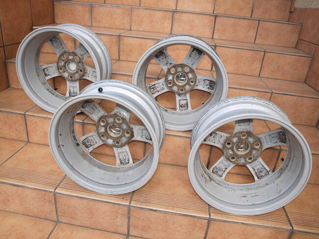 Mazda felgi alufelgi 15 oryginalne (komplet 4 sztuki)