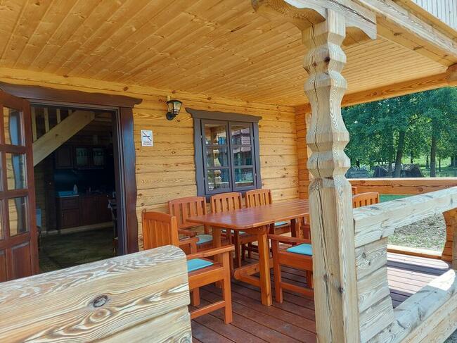 Domek nad jeziorem własna linia brzegowa pomost rower wodny.