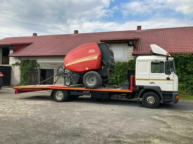 Transport maszyn rolniczych budowlanych Laweta Pomoc drogowa