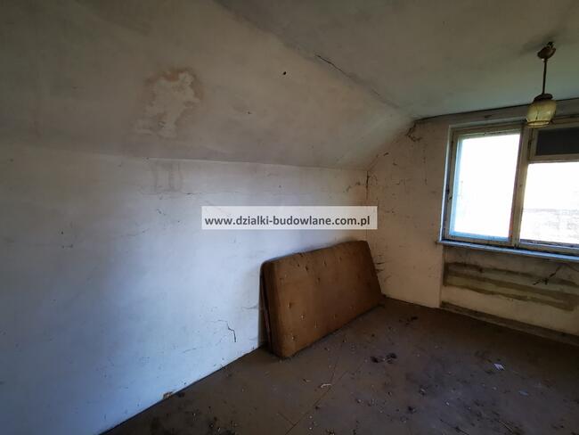 Dom poniemiecki z dużymi zabudowaniami gosp.