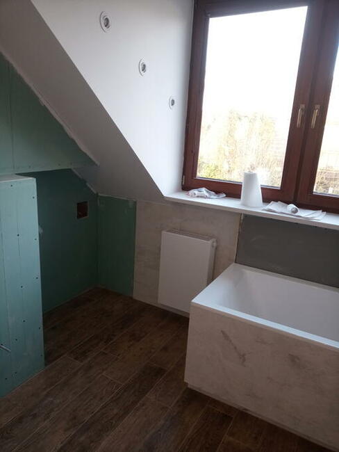 Układanie glazury , paneli Warszawa