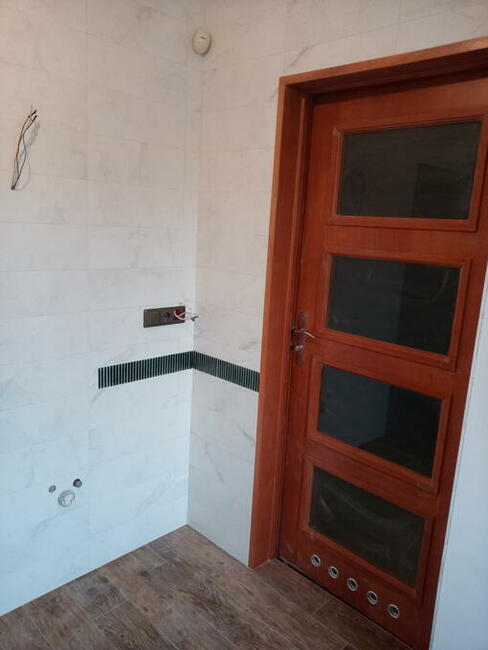 Układanie glazury , paneli Warszawa