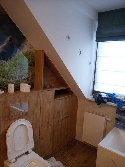 Układanie glazury , paneli Warszawa