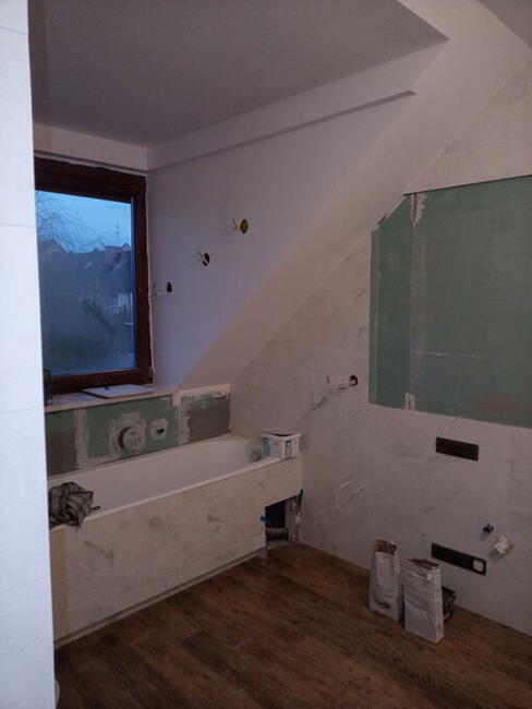 Układanie glazury , paneli Warszawa