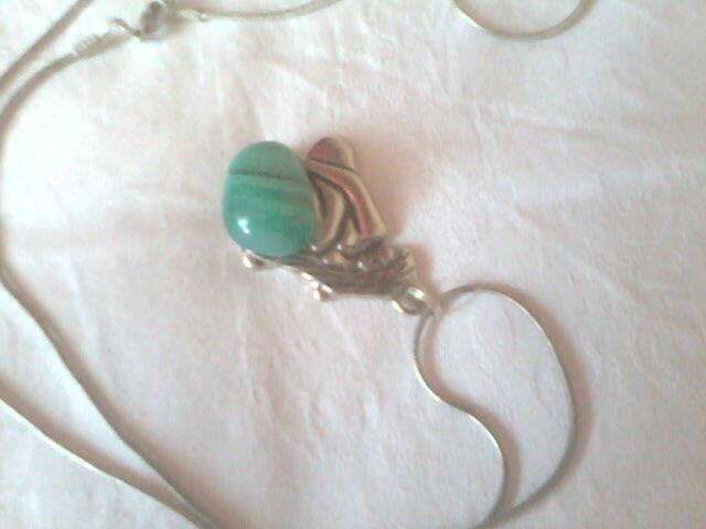 naszyjnik z zielonym oczkiem