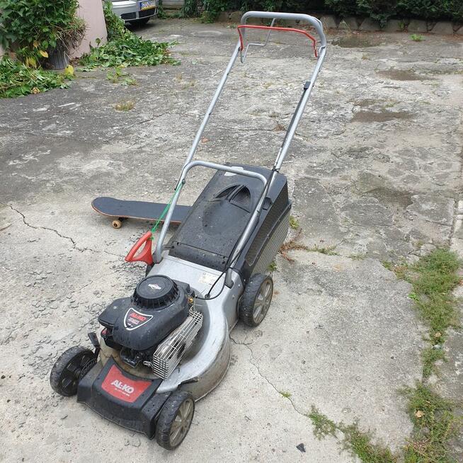 Sprzesam kosiarke