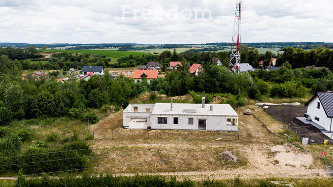 Działka z rozpoczętą budową domu jednorodzinnego