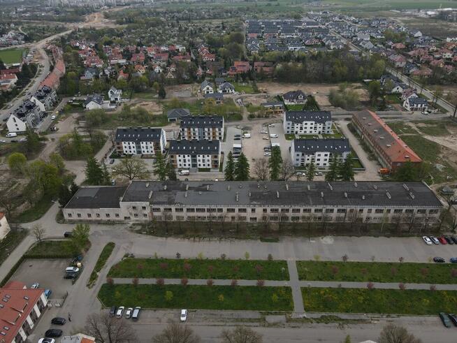 Budynek inwestycyjny z dwoma działkami