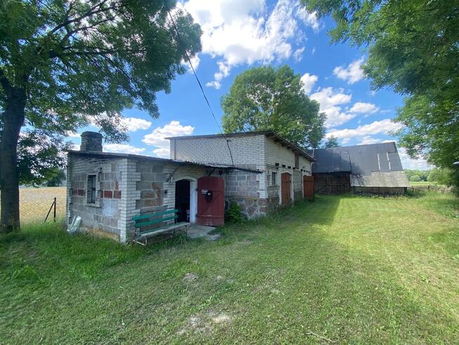 Malownicza działka z domem na sprzedaż 150 000zł