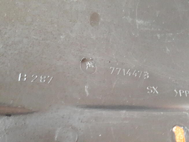 FIAT CINQUECENTO OSŁONA WNĘKI KOŁA LEWA TYŁ 7714473