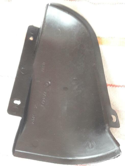 FIAT CINQUECENTO OSŁONA WNĘKI KOŁA LEWA TYŁ 7714473