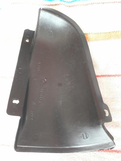 FIAT CINQUECENTO OSŁONA WNĘKI KOŁA LEWA TYŁ 7714473