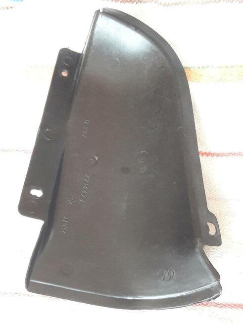 FIAT CINQUECENTO OSŁONA WNĘKI KOŁA LEWA TYŁ 7714473