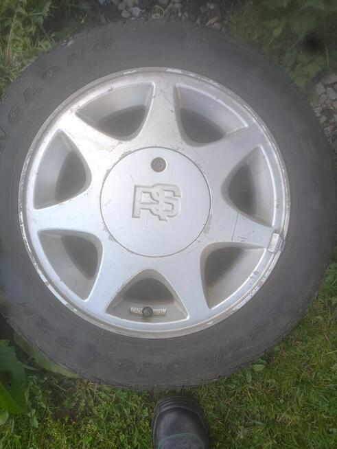 Sprzedam opony felgi aluminiowe z forda