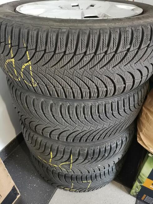 Komplet kół Opel koła zimowe - opony zimowe felgi kołpaki