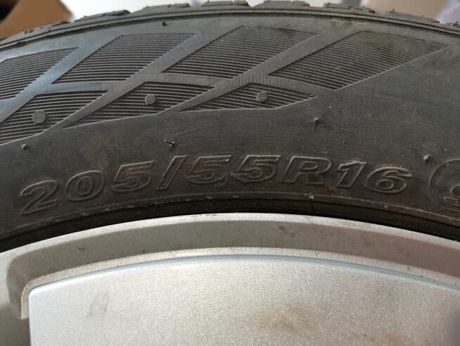 Komplet kół Opel koła zimowe - opony zimowe felgi kołpaki