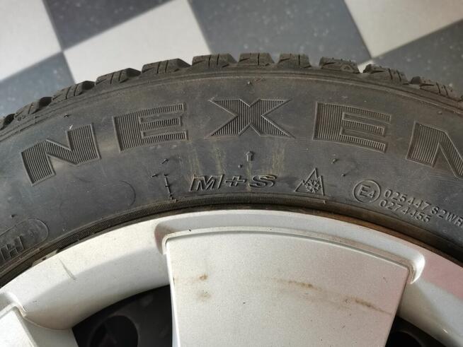 Komplet kół Opel koła zimowe - opony zimowe felgi kołpaki