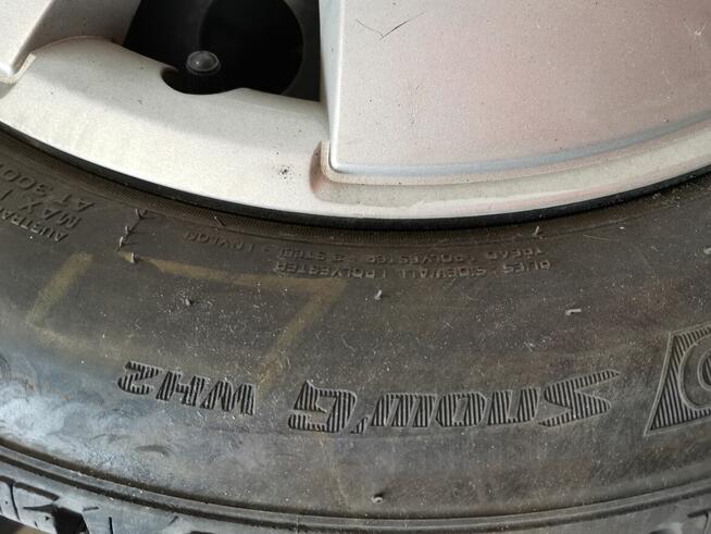 Komplet kół Opel koła zimowe - opony zimowe felgi kołpaki