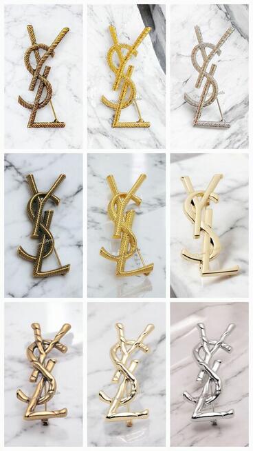 Broszka YSL Yves Saint Laurent złota 7cm