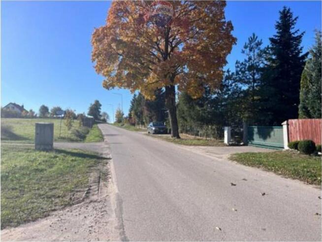 Działka w sercu mazurskiej wsi pomiędzy jeziorami