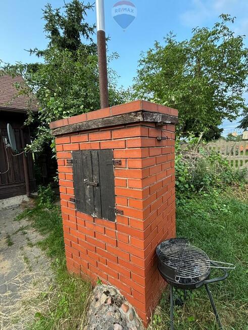 "Wiejskie Życie: Domek z Ogrodem w Feliksowie"