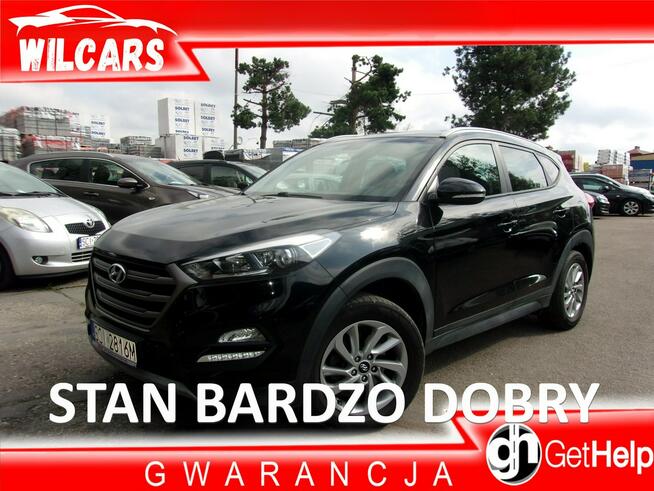 Hyundai Tucson Klimatronic, PDC przód tył, Podgrzewane fotele, Hak, Navi, 2 kpl. kół!
