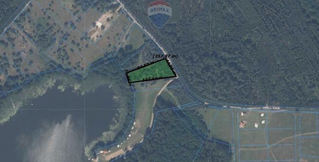 Działka budowlana z linią brzegową, Skolity