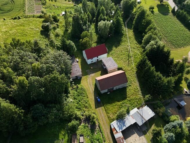 Dom z działką i budynkami gospodarczymi 14 + 40 arów