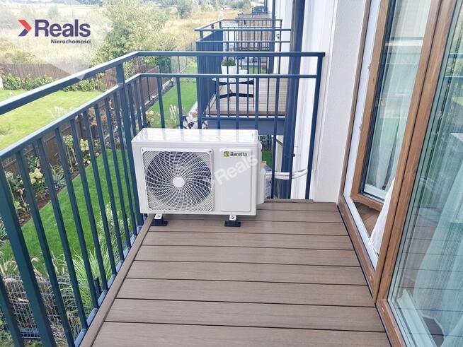 Słoneczne mieszkanie w domu szeregowym.