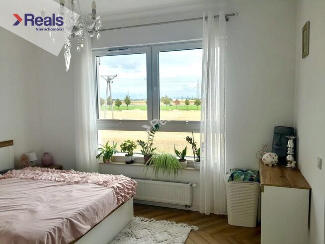 Słoneczne mieszkanie w domu szeregowym.