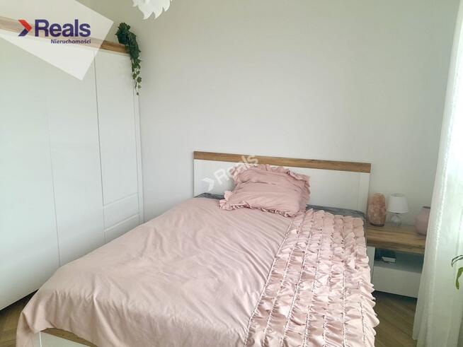 Słoneczne mieszkanie w domu szeregowym.