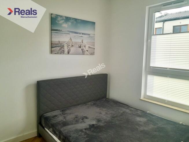 Słoneczne mieszkanie w domu szeregowym.