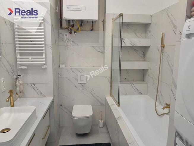 Słoneczne mieszkanie w domu szeregowym.