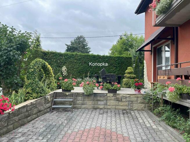 Gotowy do zamieszkania, z pięknym ogrodem i dwoma tarasami