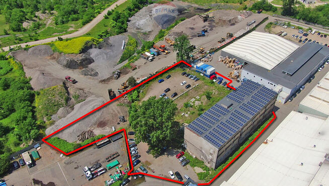 Budynek przemysłowy z działką budowlaną