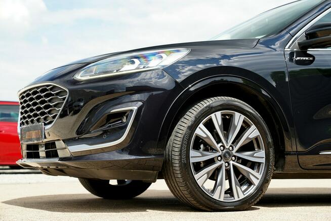 Ford Kuga VIGNALE skóra Nawi FUL LED el.klapa ACC 4x4 B&Q grzane fotele i kanapa
