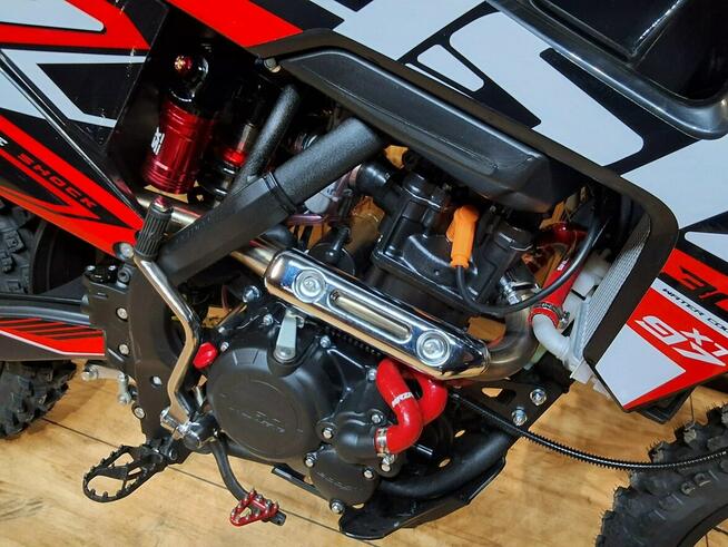 ASIX Inny XT 97 ASIX XT-97 CROSS kros o pojemności 300 z 26 konnym silnikiem HIT