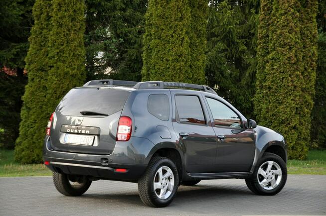 Dacia Duster 1.2i(125KM)*116tyś.km*Kolorowa Navi*Welur*Reling*Parktronik*ALU 16"ASO