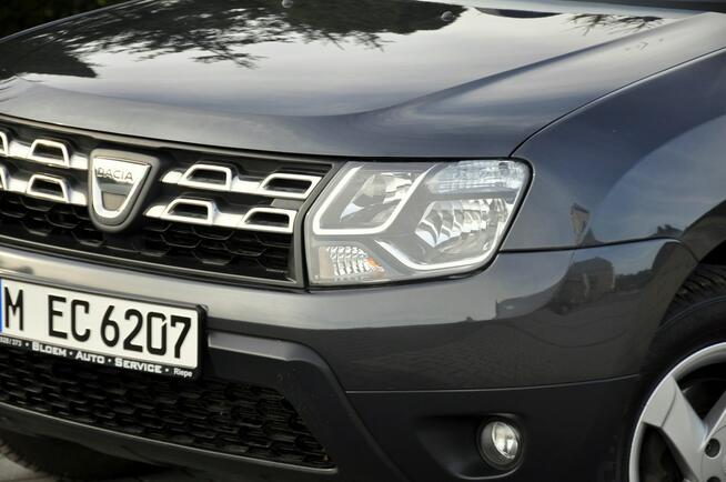 Dacia Duster 1.2i(125KM)*116tyś.km*Kolorowa Navi*Welur*Reling*Parktronik*ALU 16"ASO