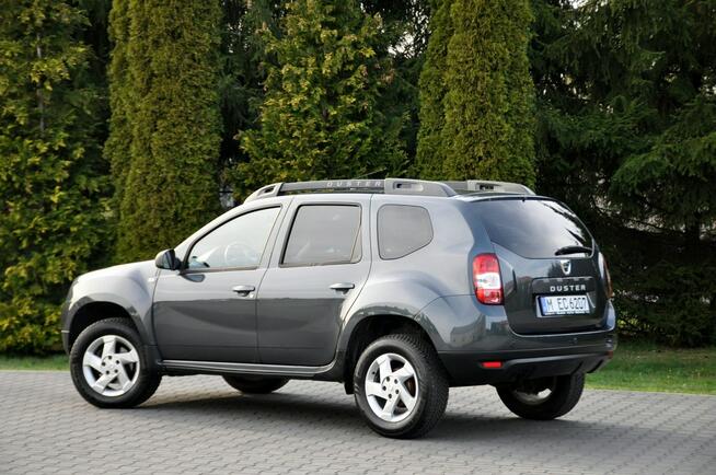 Dacia Duster 1.2i(125KM)*116tyś.km*Kolorowa Navi*Welur*Reling*Parktronik*ALU 16"ASO