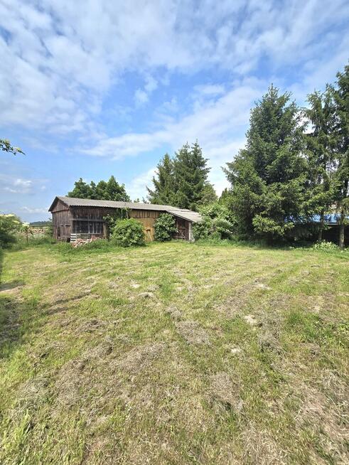 Piękne siedlisko z dwoma drewnianymi domami