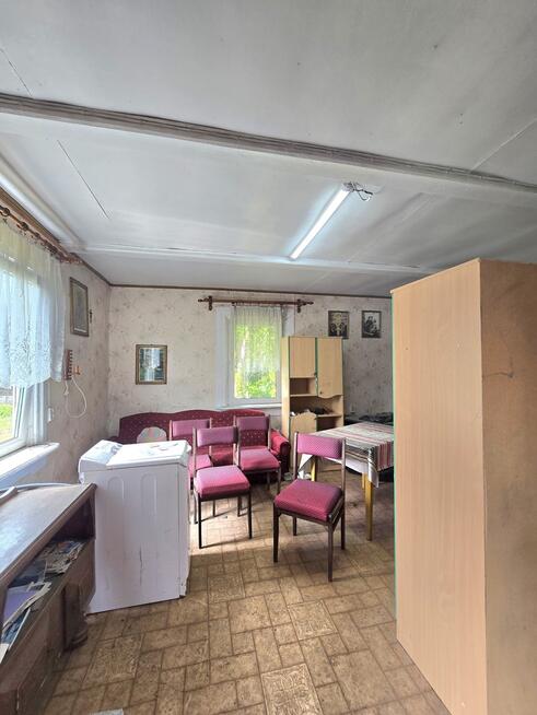 Piękne siedlisko z dwoma drewnianymi domami